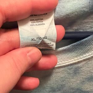 Handmade tshirt never worn the size is X-Large 
It’s %100 cotton